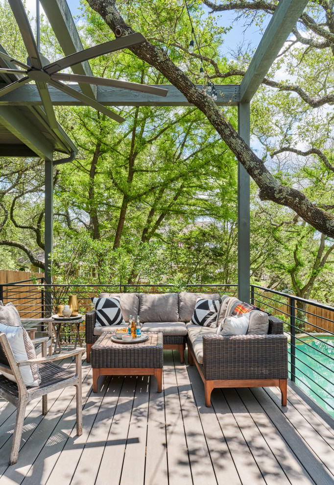 Photo of a medium sized contemporary back metal railing terrace in Austin.