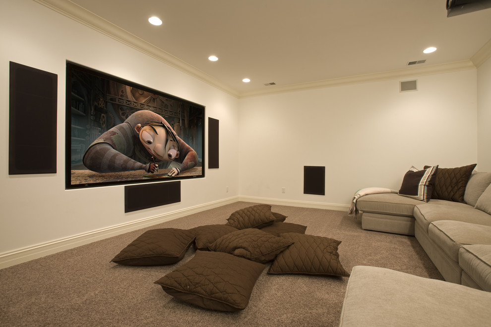 This is an example of a mediterranean home theatre in Minneapolis with brown floor.