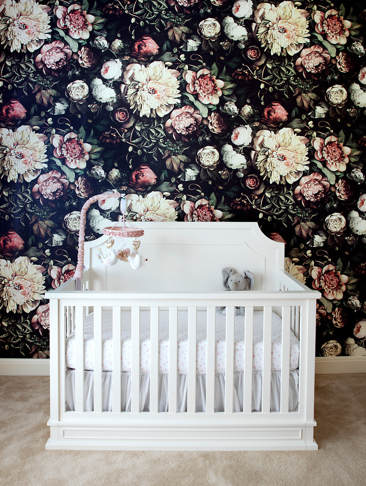Mid-sized contemporary gender-neutral nursery in Austin with black walls, carpet and beige floor.