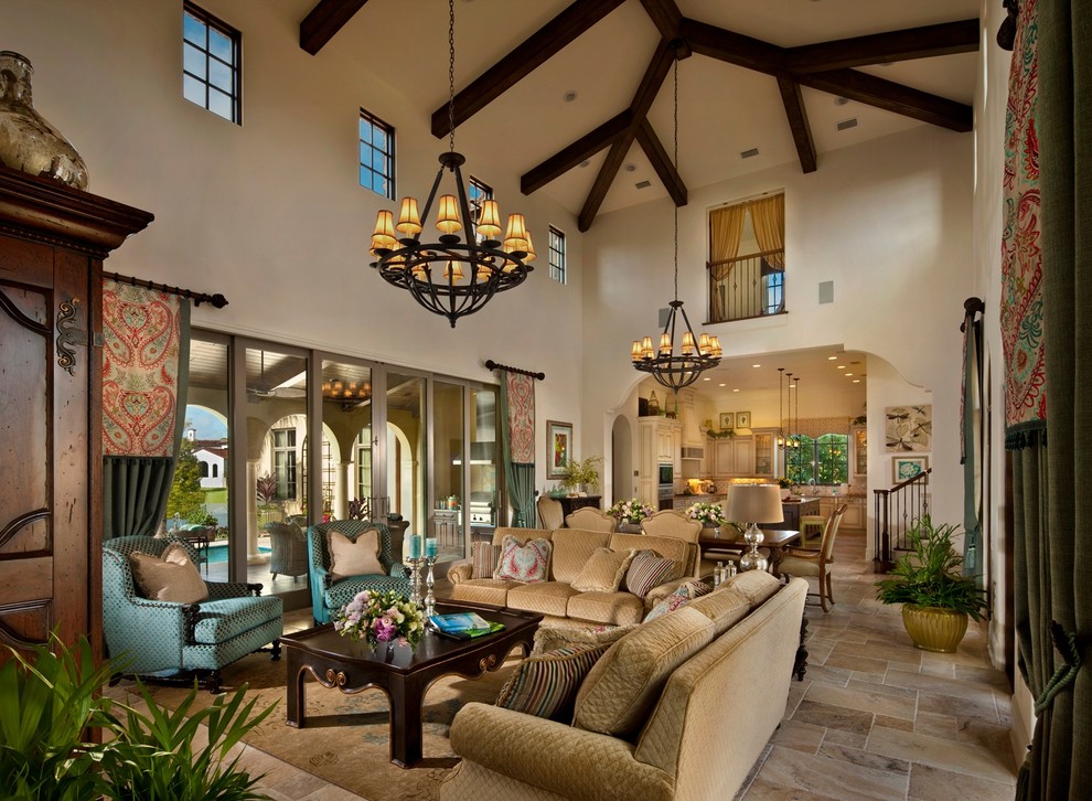 Photo of a mediterranean formal open concept living room in Orlando with beige walls, no fireplace and no tv.