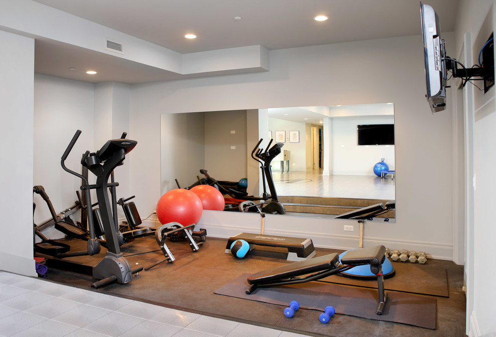 Design ideas for a mid-sized contemporary multipurpose gym in Chicago with white walls.