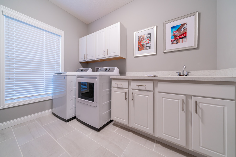 Transitional laundry room photo in Cleveland