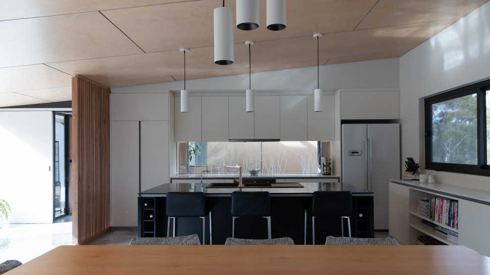 Design ideas for a contemporary galley kitchen in Hobart with with island.