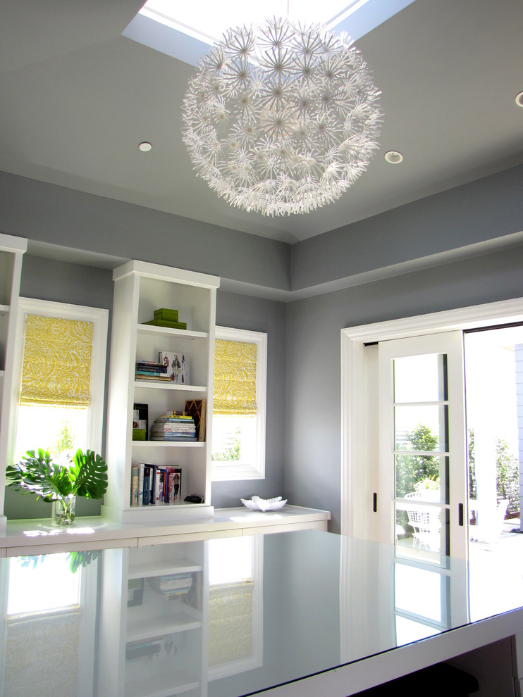 Inspiration for a beach style home office in Orange County with grey walls.