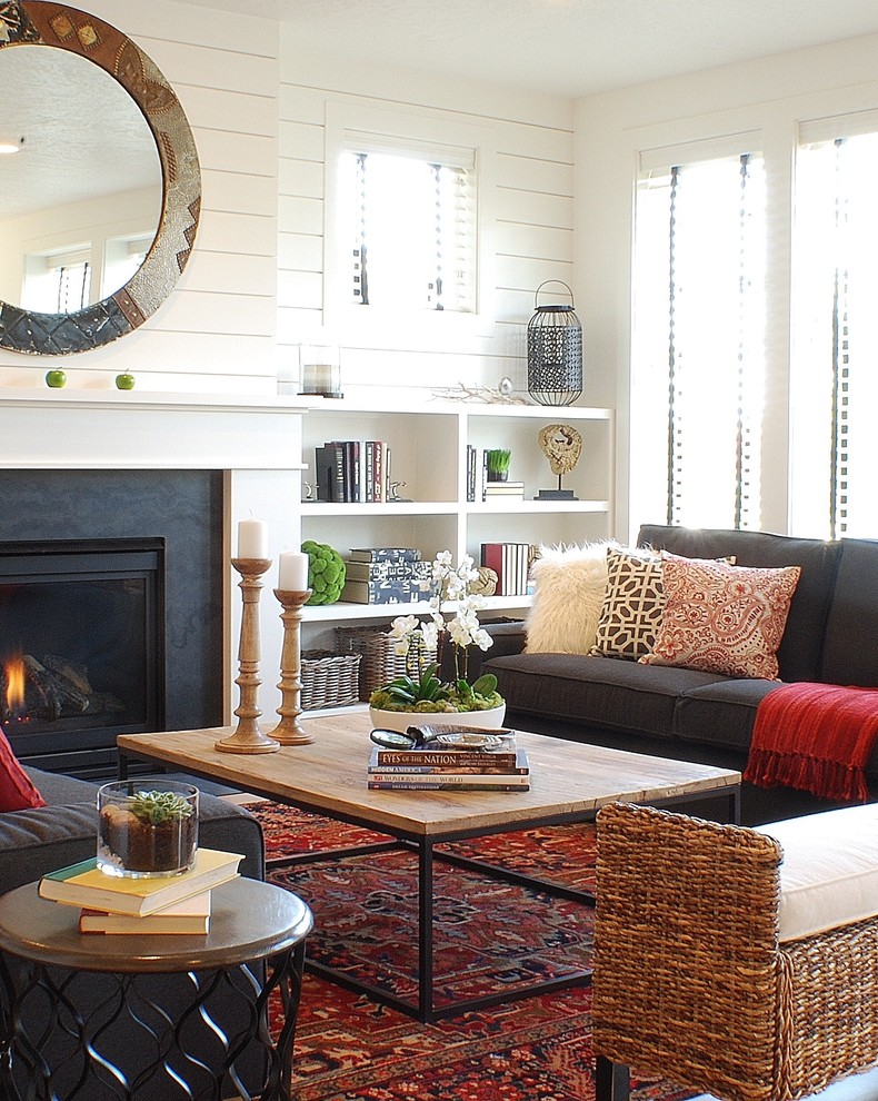 Photo of a small country open concept living room in Boise with white walls and a standard fireplace.