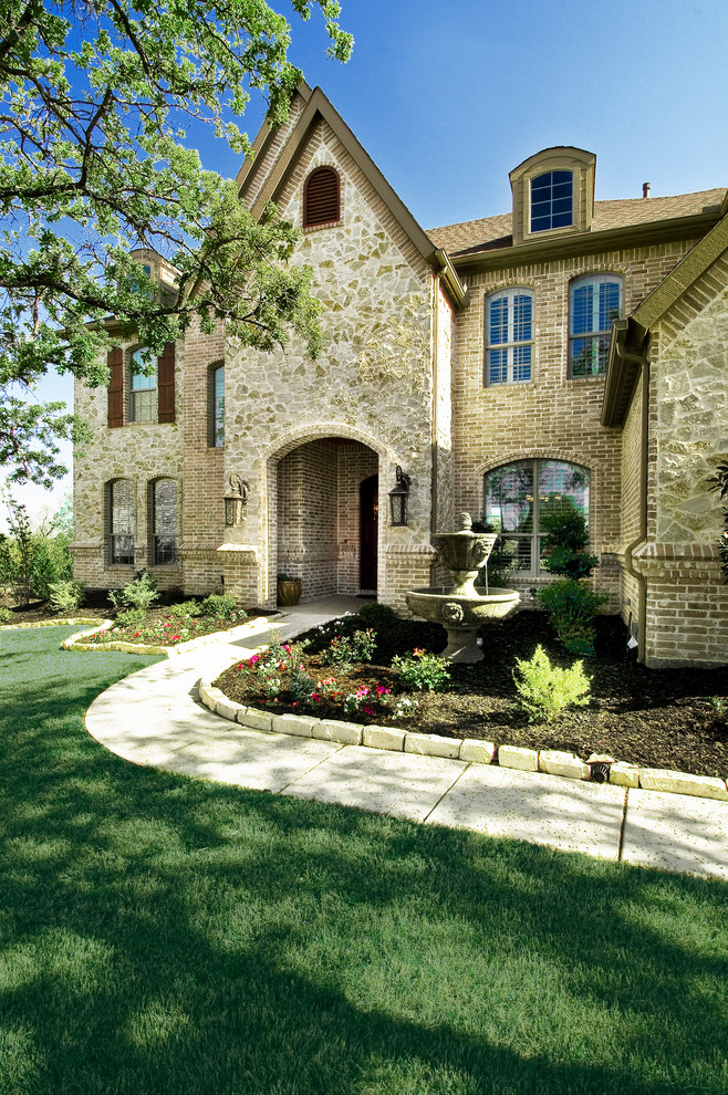 Inspiration for a traditional brick exterior in Dallas.