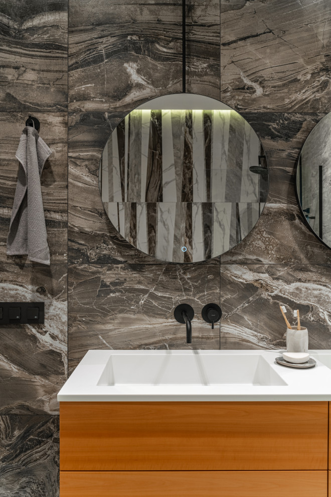Inspiration for a medium sized scandinavian cloakroom in Saint Petersburg with flat-panel cabinets, medium wood cabinets, beige tiles, marble tiles, beige walls, wood-effect flooring, a submerged sink, tiled worktops, beige floors, white worktops and a floating vanity unit.
