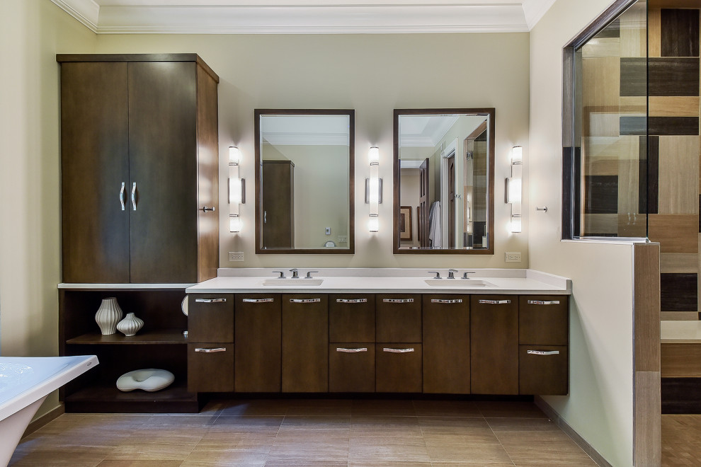 Inspiration for a mid-sized contemporary master bathroom in Chicago with flat-panel cabinets, brown cabinets, a freestanding tub, multi-coloured tile, porcelain tile, beige walls, porcelain floors, an undermount sink, engineered quartz benchtops, beige floor and white benchtops.