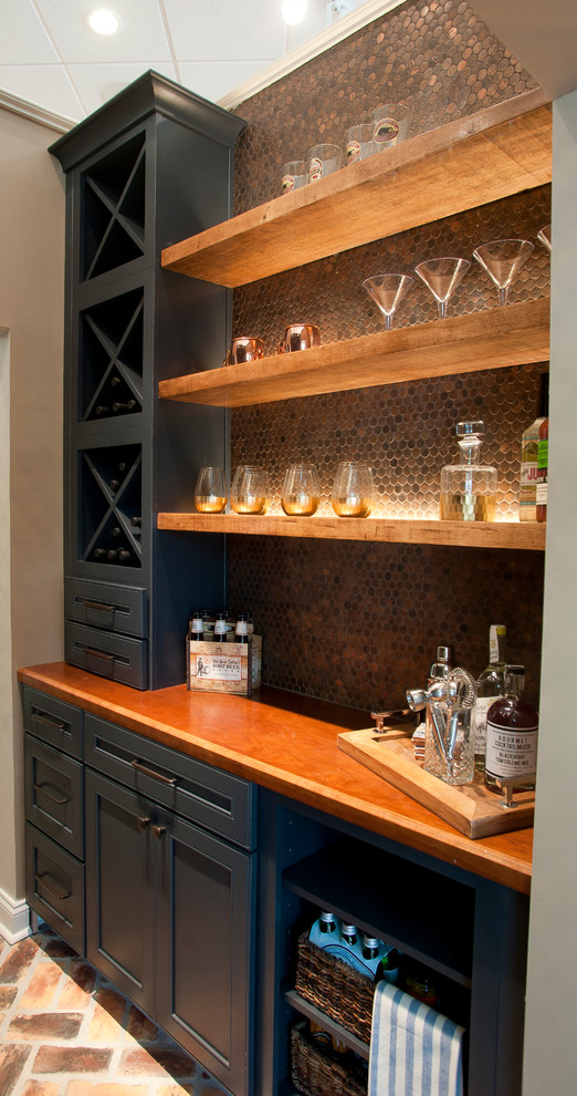 Inspiration for a contemporary galley home bar in Atlanta with no sink, recessed-panel cabinets, blue cabinets, wood benchtops, mosaic tile splashback, brick floors, red floor, brown benchtop and brown splashback.