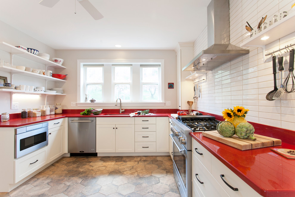 Design ideas for a country u-shaped kitchen in New York with an undermount sink, shaker cabinets, white cabinets, white splashback, no island and red benchtop.