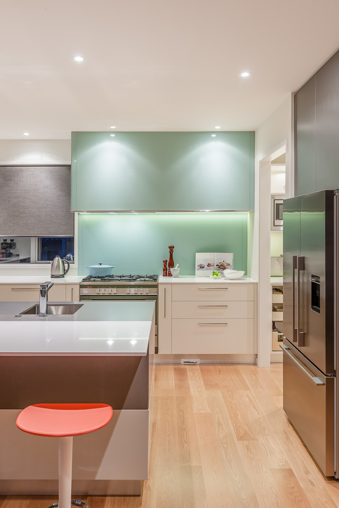 Medium sized world-inspired kitchen in Auckland.
