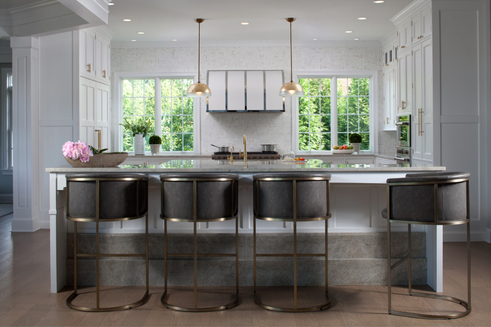 Inspiration for a modern dark wood floor and brown floor eat-in kitchen remodel in Baltimore with recessed-panel cabinets, white cabinets, soapstone countertops, stainless steel appliances, an island and gray countertops