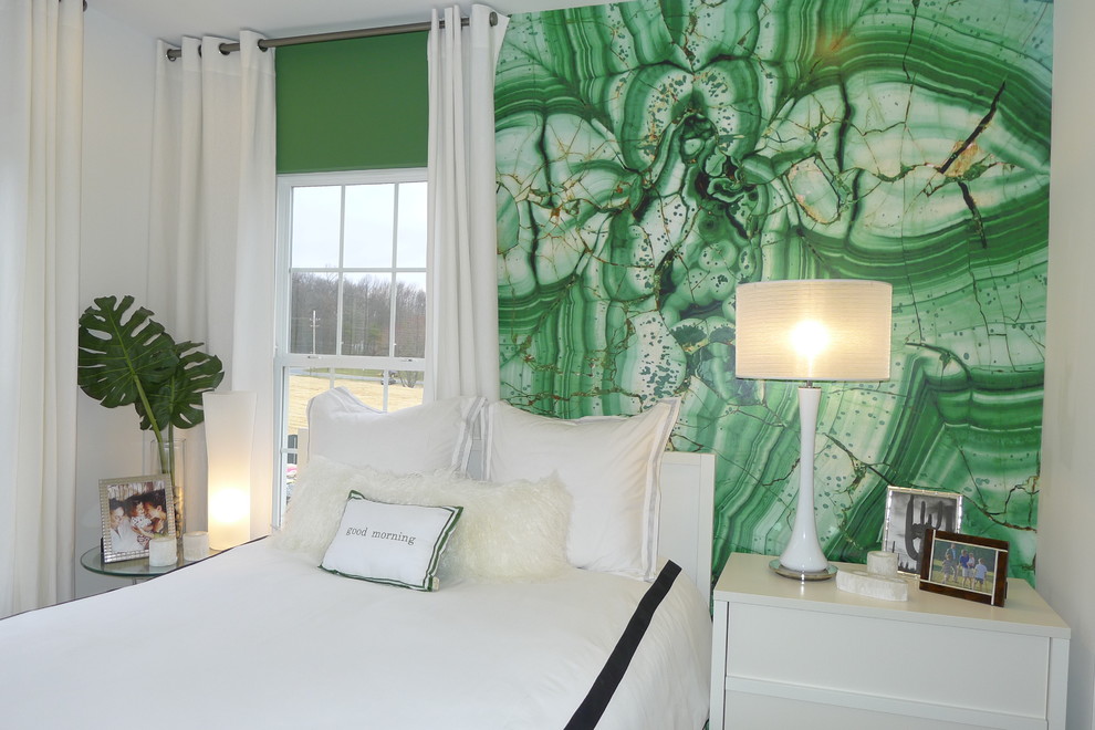 Design ideas for a modern bedroom in DC Metro with green walls.