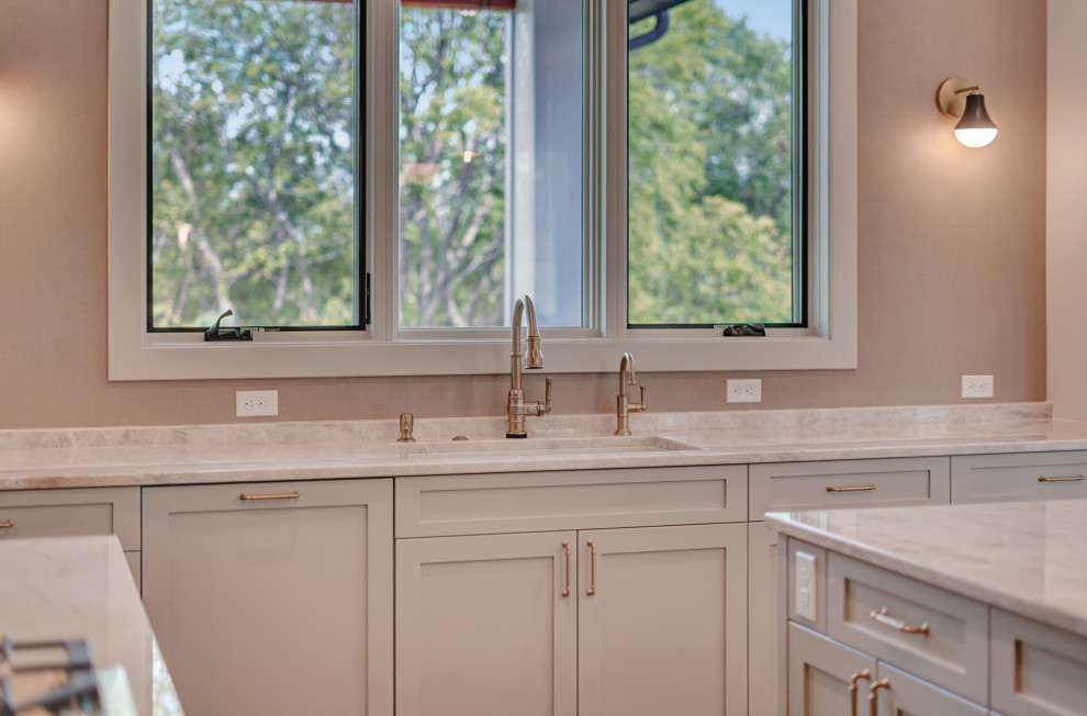 Laundry room - transitional laundry room idea in Omaha