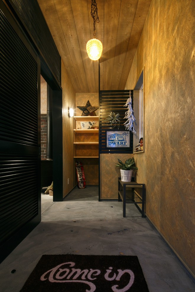 Inspiration for an industrial entryway in Other.