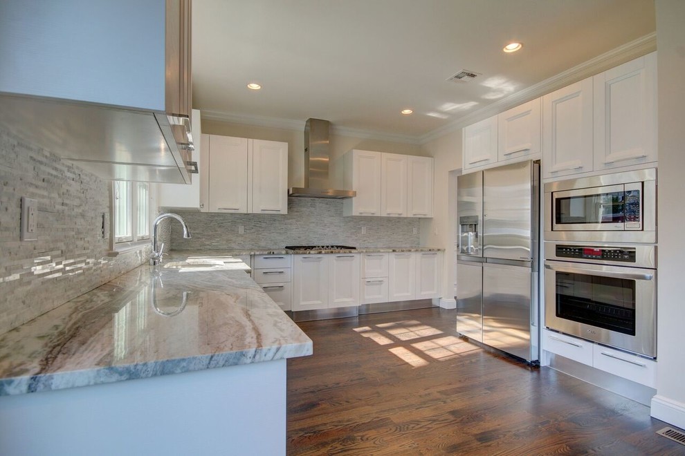 Kitchen - mid-sized transitional u-shaped brown floor kitchen idea in New York with shaker cabinets, white cabinets, quartz countertops, gray backsplash and gray countertops