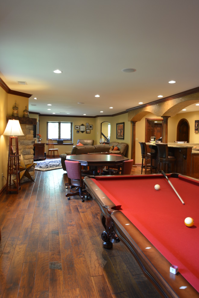 This is an example of an expansive mediterranean walk-out basement in Milwaukee.