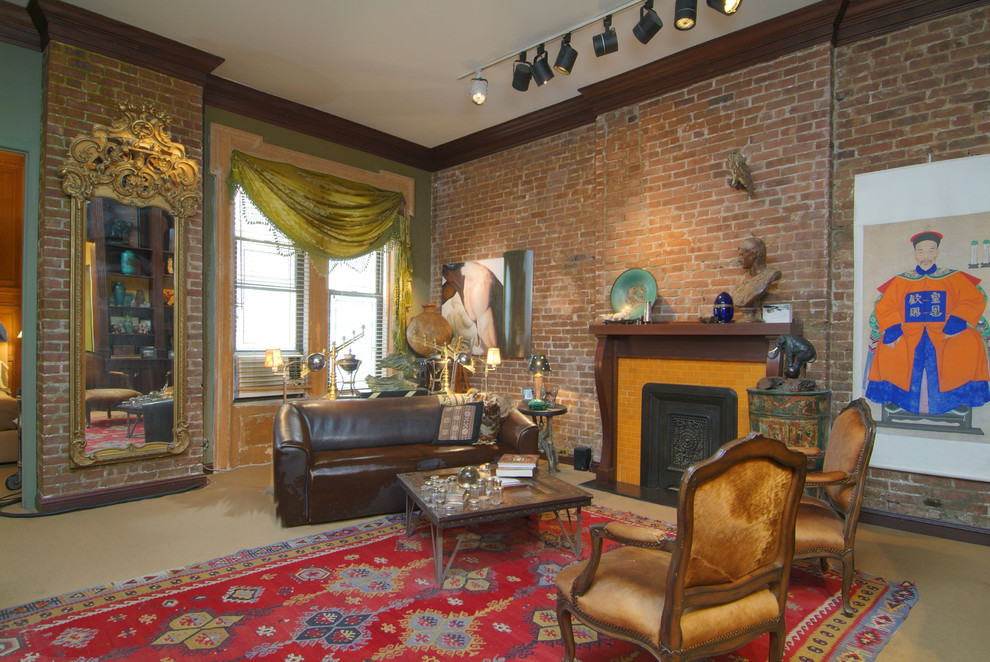 Photo of a mid-sized eclectic enclosed living room in New York with carpet, a standard fireplace and a wood fireplace surround.