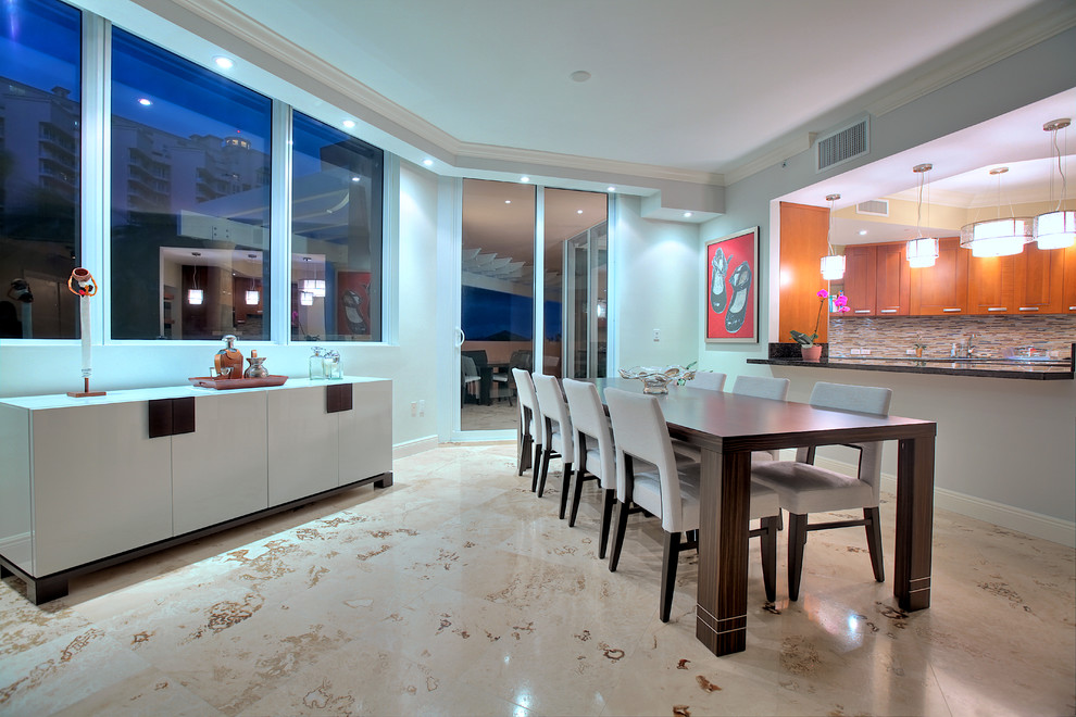 This is an example of a mid-sized contemporary open plan dining in Miami with grey walls, no fireplace and marble floors.