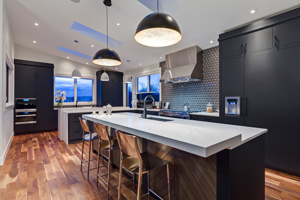 Example of a mountain style kitchen design in Calgary
