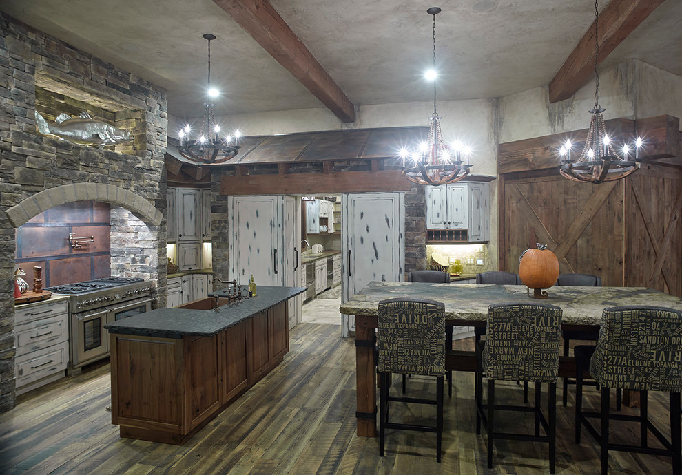 Example of a mountain style kitchen design in Denver