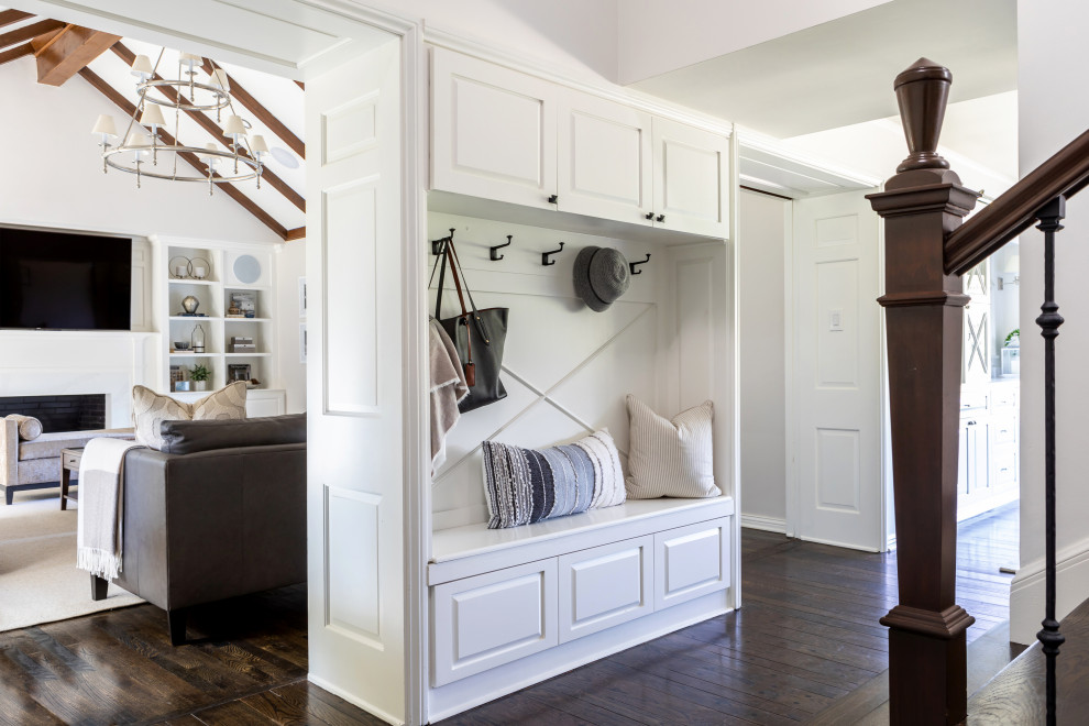 Mid-sized country mudroom in Los Angeles with medium hardwood floors, a single front door, a white front door, grey walls and brown floor.