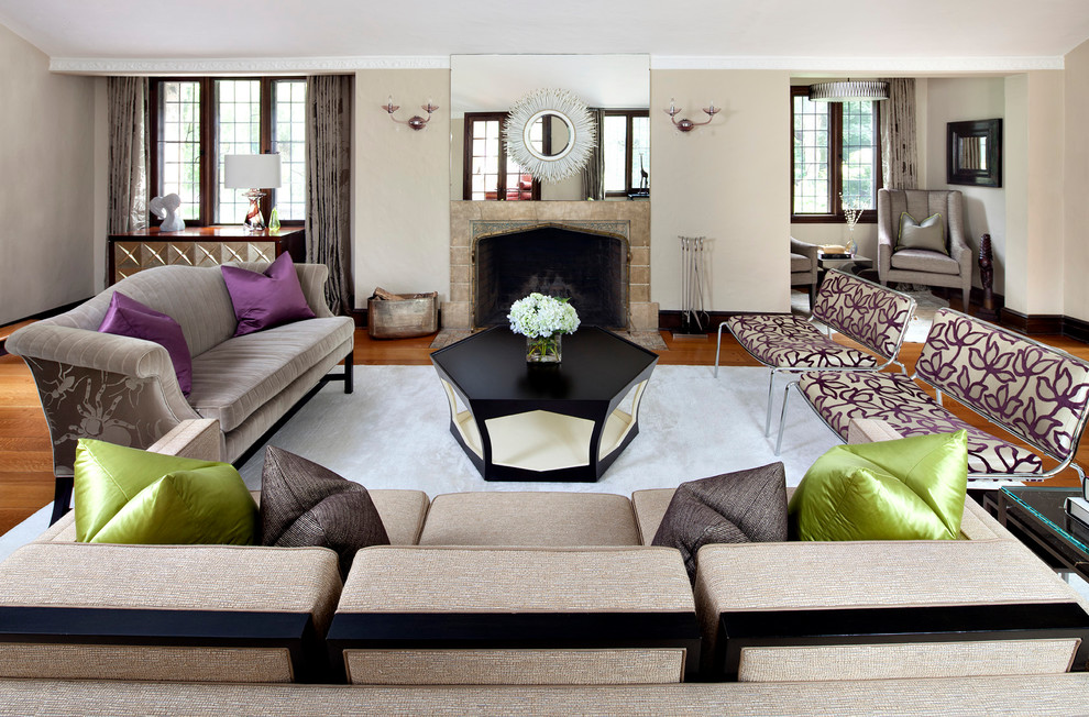 Large contemporary formal living room in New York with beige walls and a standard fireplace.