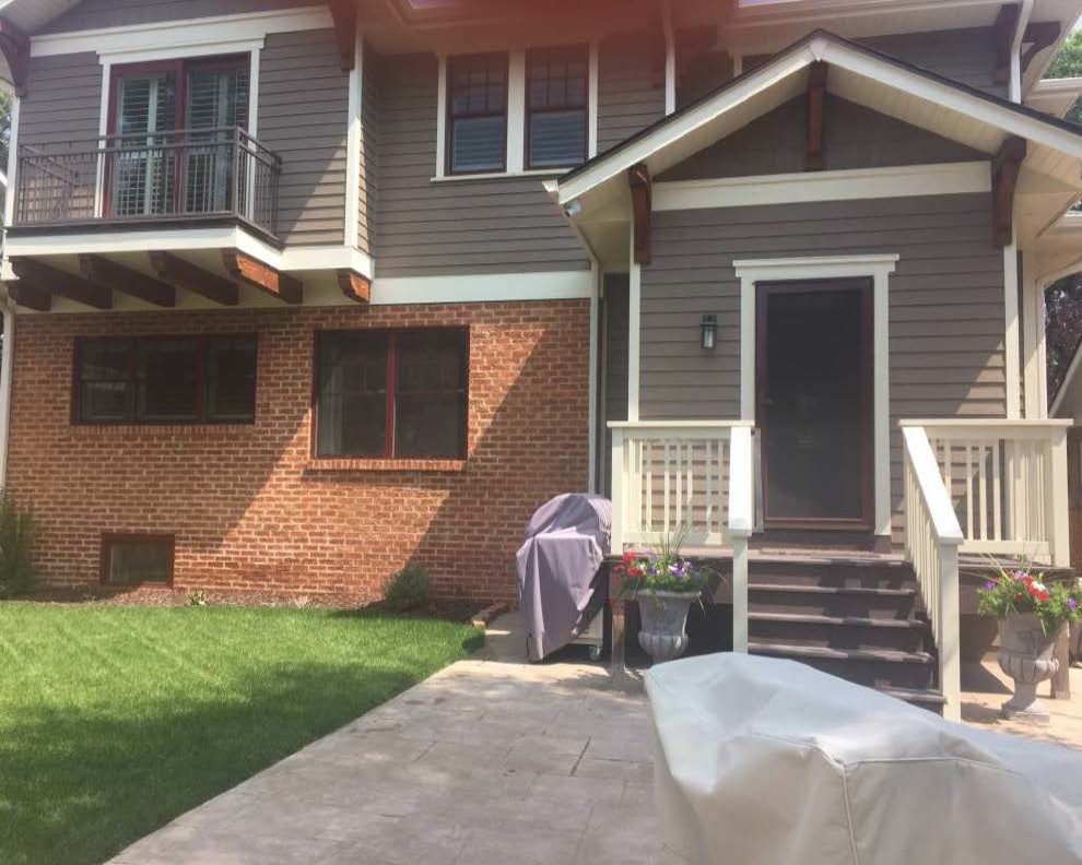 Deck - mid-sized transitional backyard deck idea in Denver with no cover