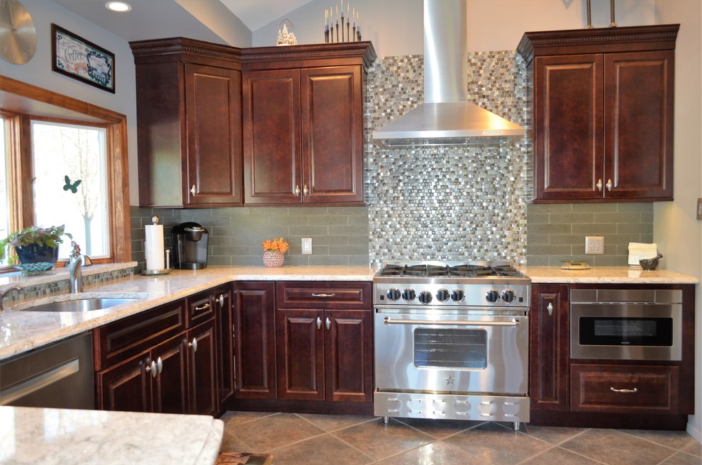 Example of a transitional kitchen design in New York