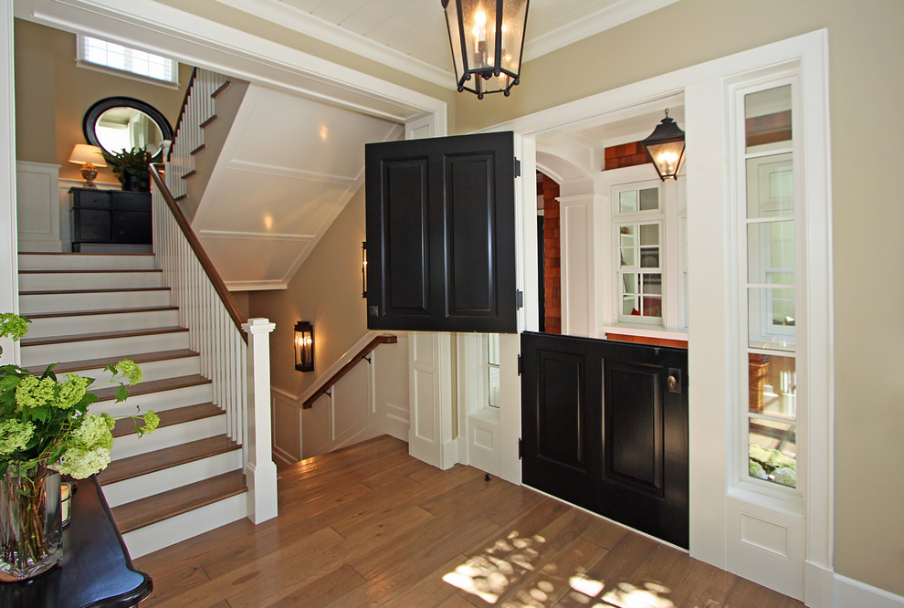 Photo of a traditional entryway in Orange County with a dutch front door.