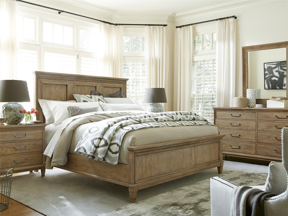 Example of a large transitional master medium tone wood floor and brown floor bedroom design in Philadelphia with white walls and no fireplace