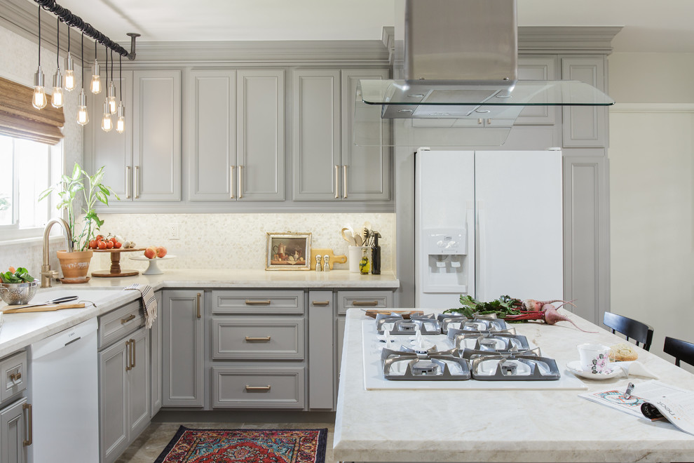 Photo of a mid-sized transitional l-shaped kitchen in San Diego with recessed-panel cabinets, grey cabinets, quartzite benchtops, white splashback, white appliances, porcelain floors, with island, beige floor, a single-bowl sink, mosaic tile splashback and white benchtop.
