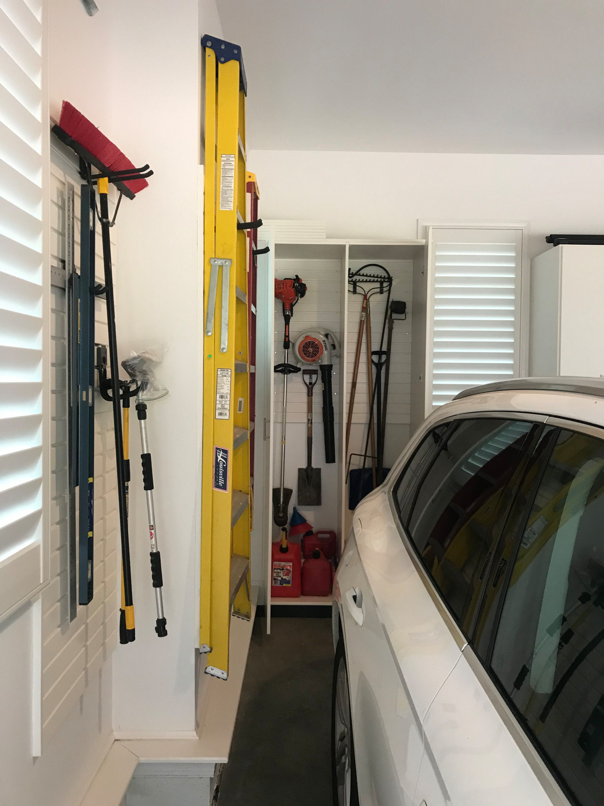 Garage with Cabinets & Slat Wall
