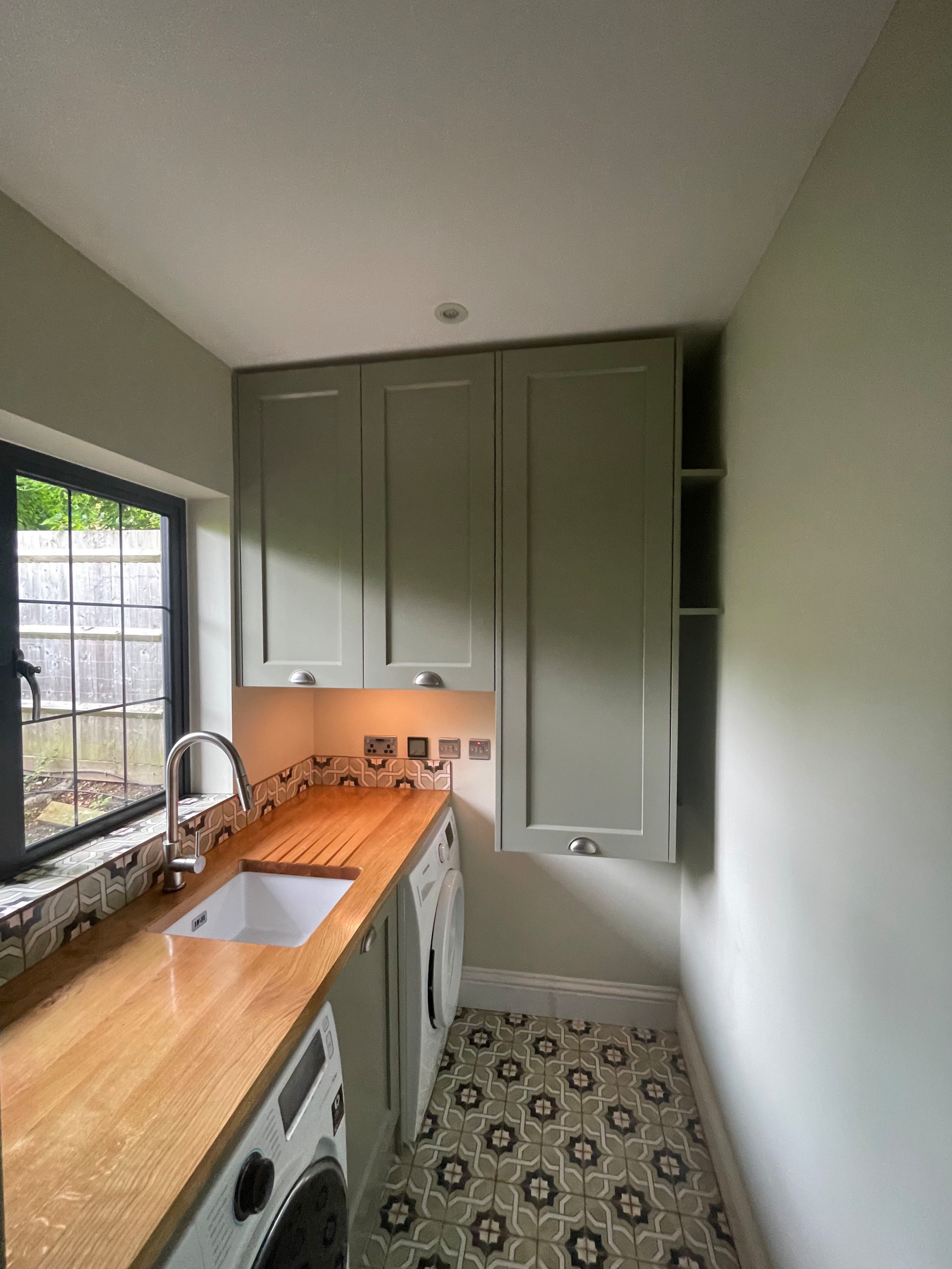 Bespoke cabinets for utility room