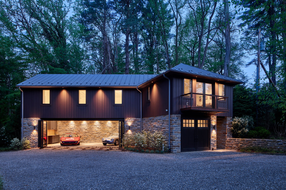 Inspiration for a contemporary detached three-car garage in Philadelphia.