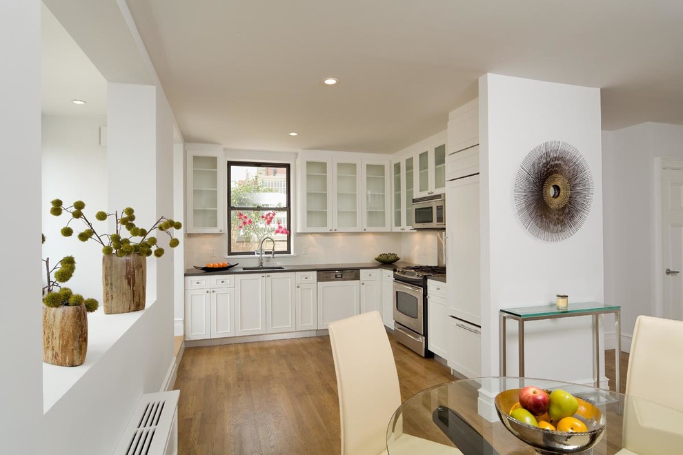 Design ideas for a contemporary kitchen in New York with panelled appliances.