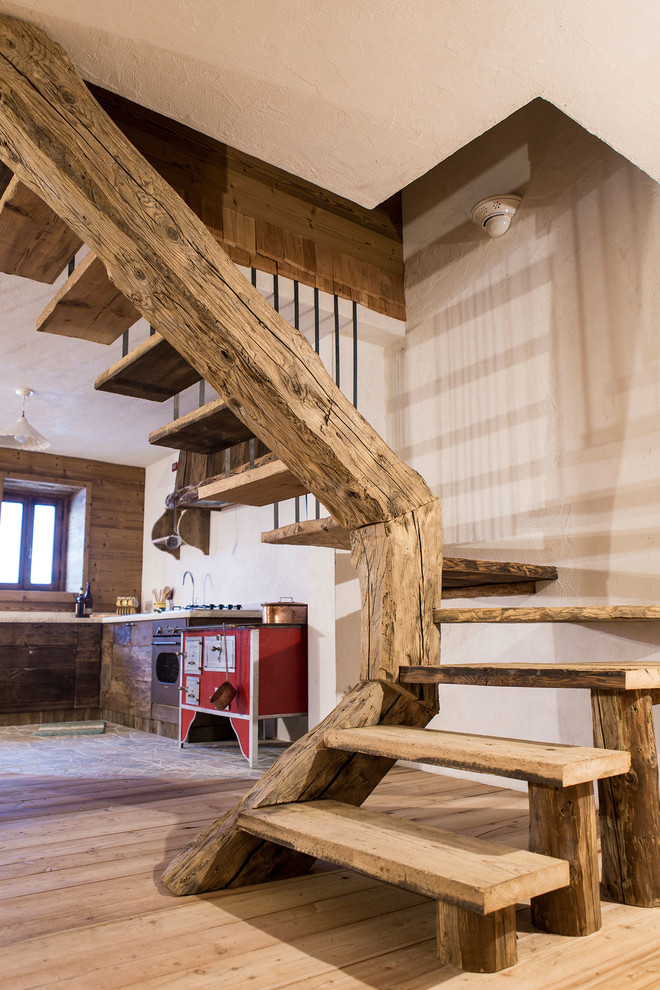 Staircase - rustic staircase idea in Venice