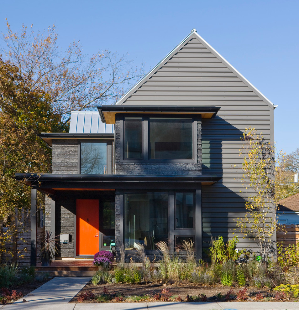 Mid-sized trendy gray two-story gable roof photo in Chicago with a metal roof