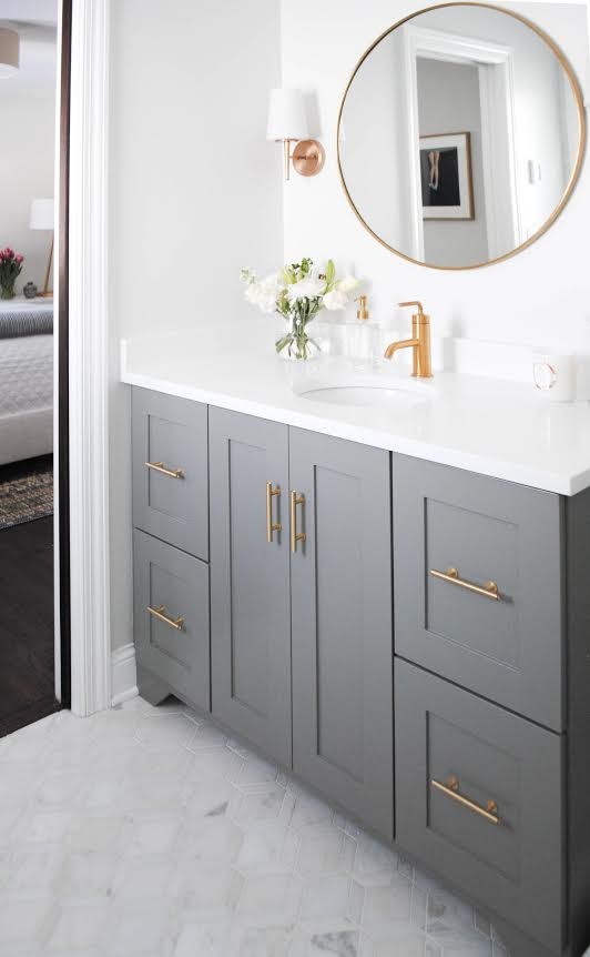Inspiration for a small transitional 3/4 bathroom in Minneapolis with shaker cabinets, grey cabinets, a two-piece toilet, white walls, marble floors, an undermount sink, engineered quartz benchtops and grey floor.