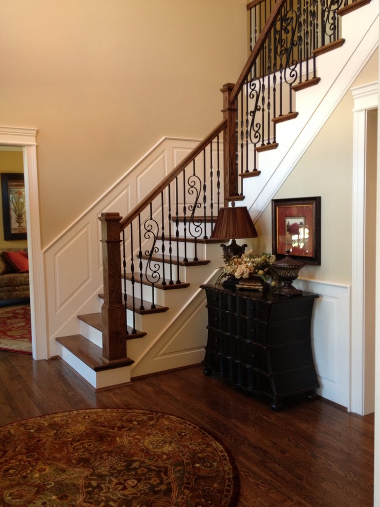 Foyer - transitional dark wood floor foyer idea in Cincinnati with beige walls