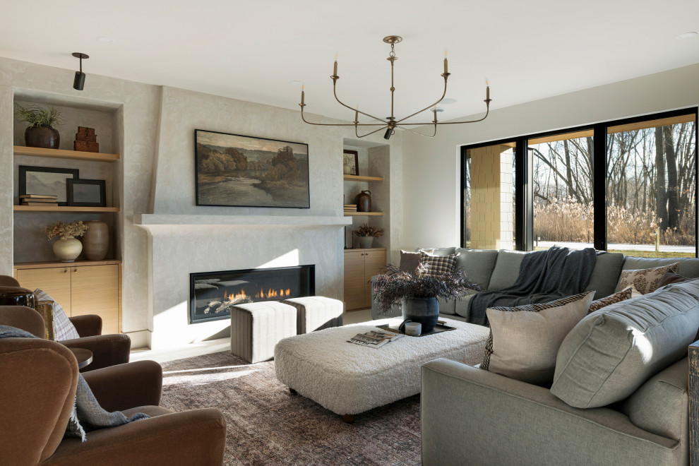 Country living room in Minneapolis with white walls, a ribbon fireplace and beige floor.