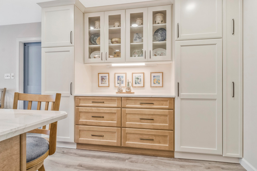 Kitchen pantry - huge transitional u-shaped kitchen pantry idea in DC Metro with an undermount sink, recessed-panel cabinets, quartz countertops, white backsplash, subway tile backsplash, stainless steel appliances, a peninsula and white countertops