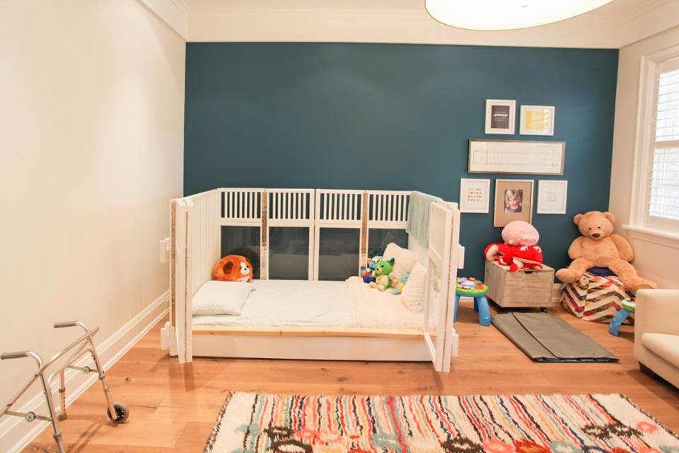 This is an example of an expansive arts and crafts kids' bedroom for kids 4-10 years old and girls in Toronto.