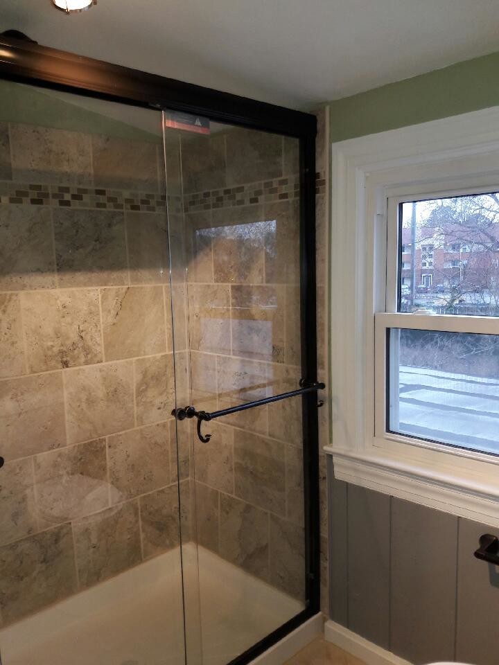 Inspiration for a mid-sized transitional 3/4 beige tile, brown tile and ceramic tile ceramic tile and beige floor alcove shower remodel with green walls