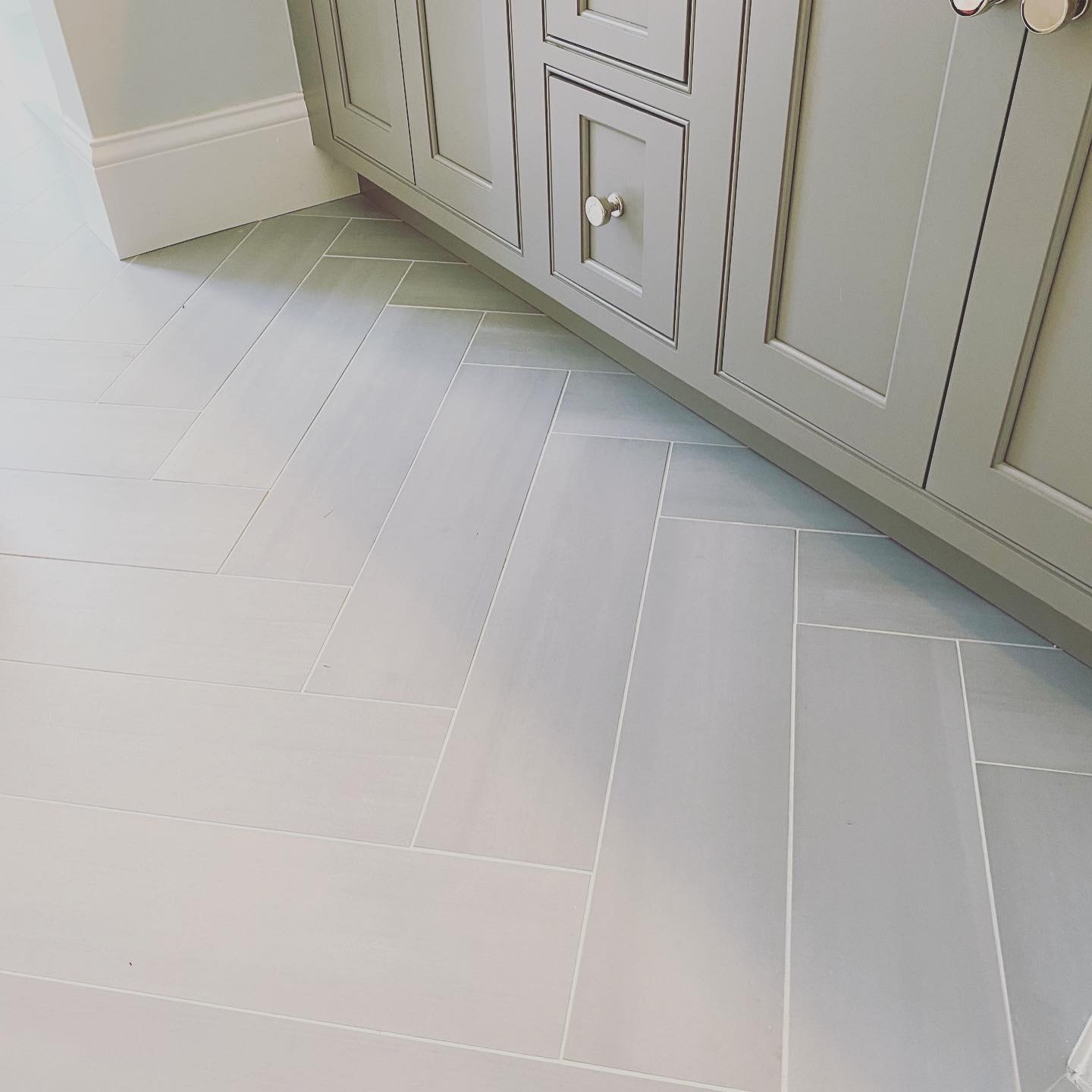 Kid's Bathroom with Penny Tile striped shower