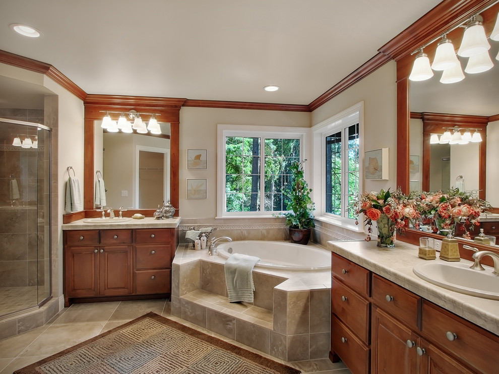 Photo of a traditional bathroom in Other with a drop-in tub.