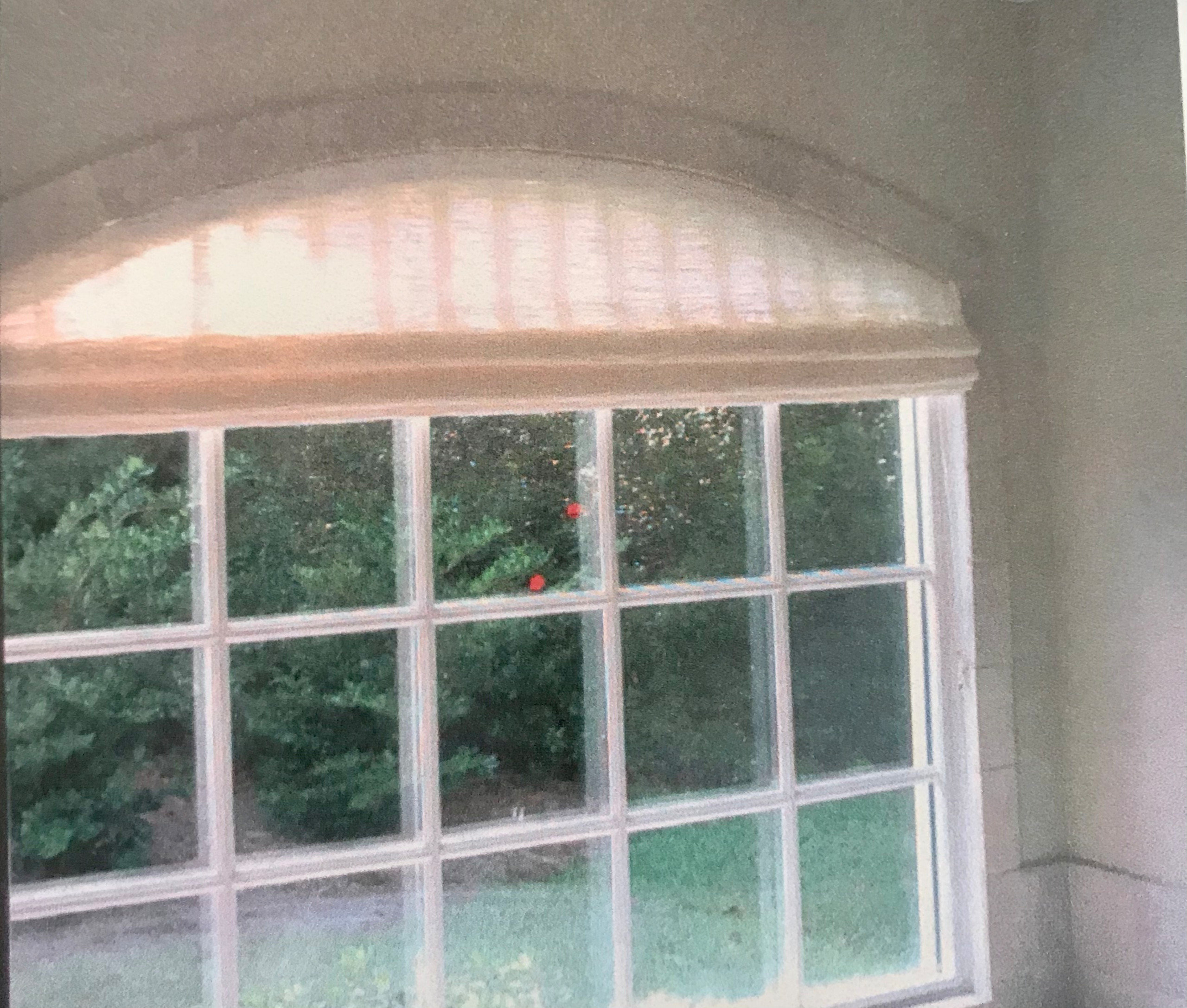 Conrad arched woven shade