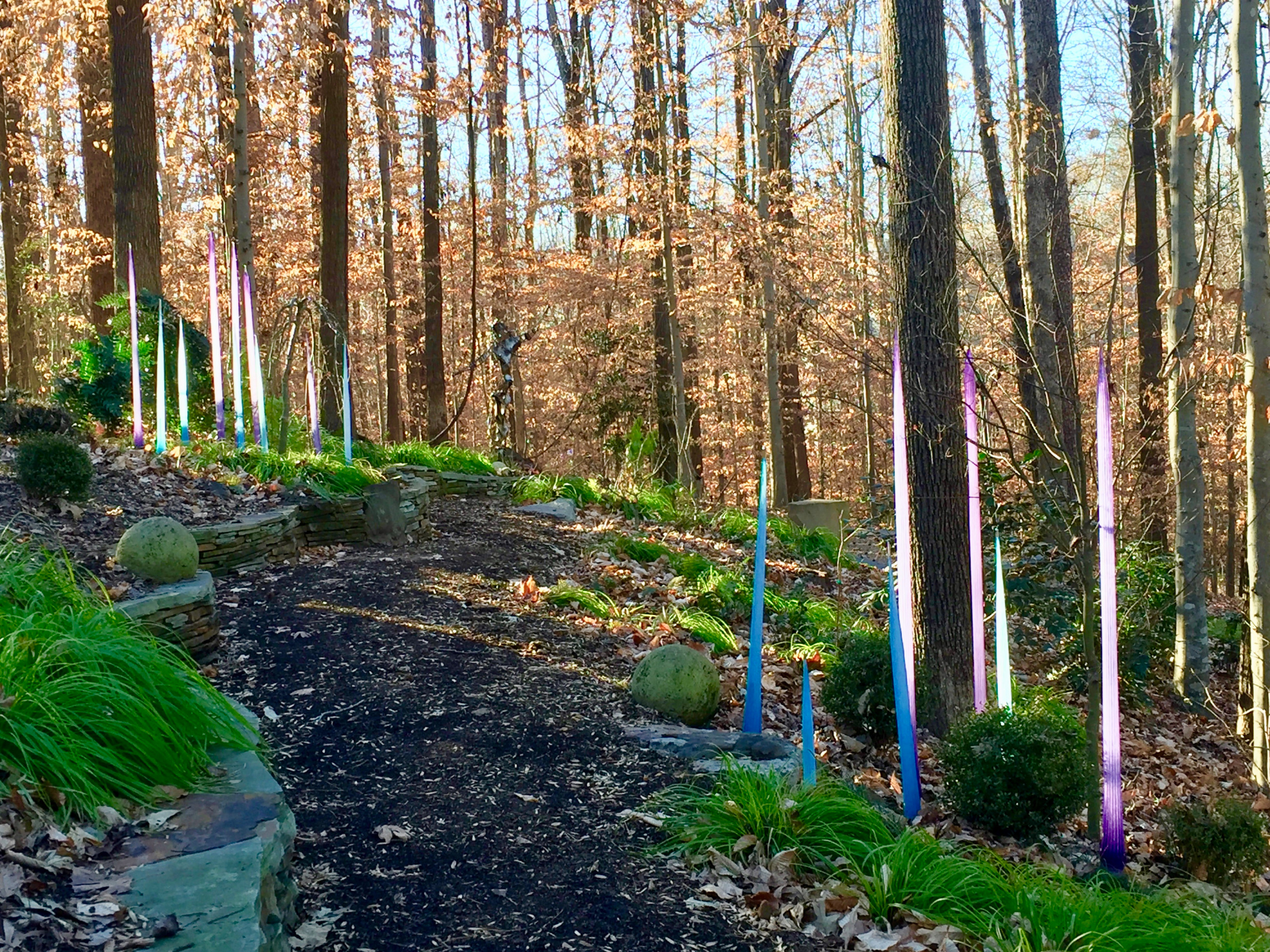 Glass garden sculpture in the afternoon light.