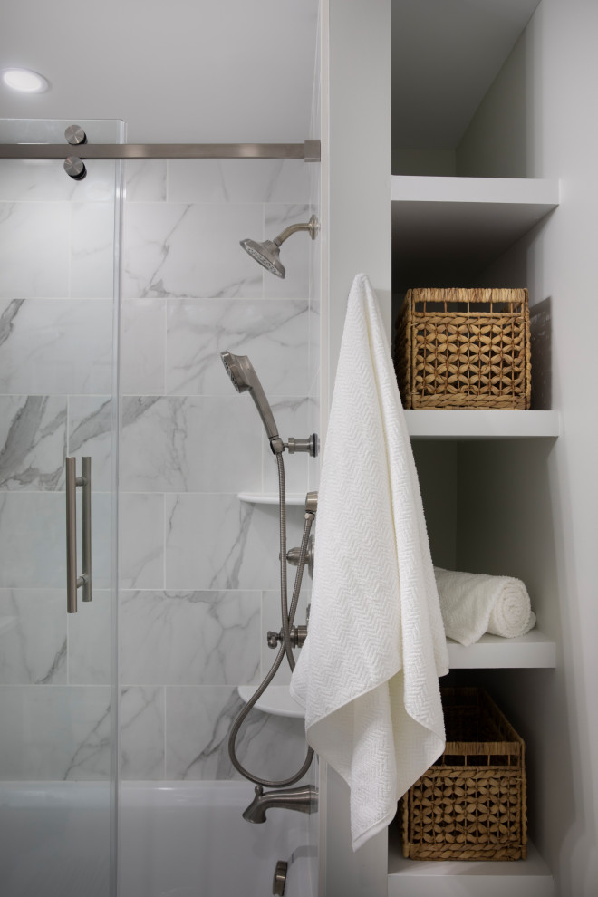 Alcove bathtub - mid-sized coastal master gray tile alcove bathtub idea with gray walls and a hinged shower door