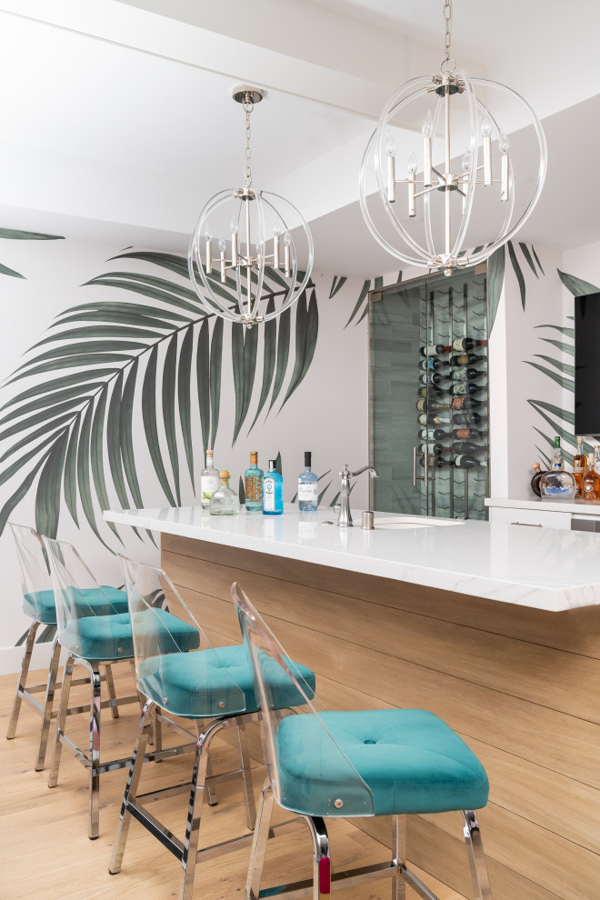 Design ideas for a large contemporary home bar in Los Angeles.